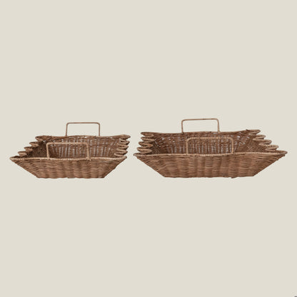 Scalloped rattan trays stacked to show how they nest