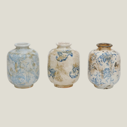 Set of 3 small terra-cotta vases in cream with blue and soft green-blue patterns, front view
